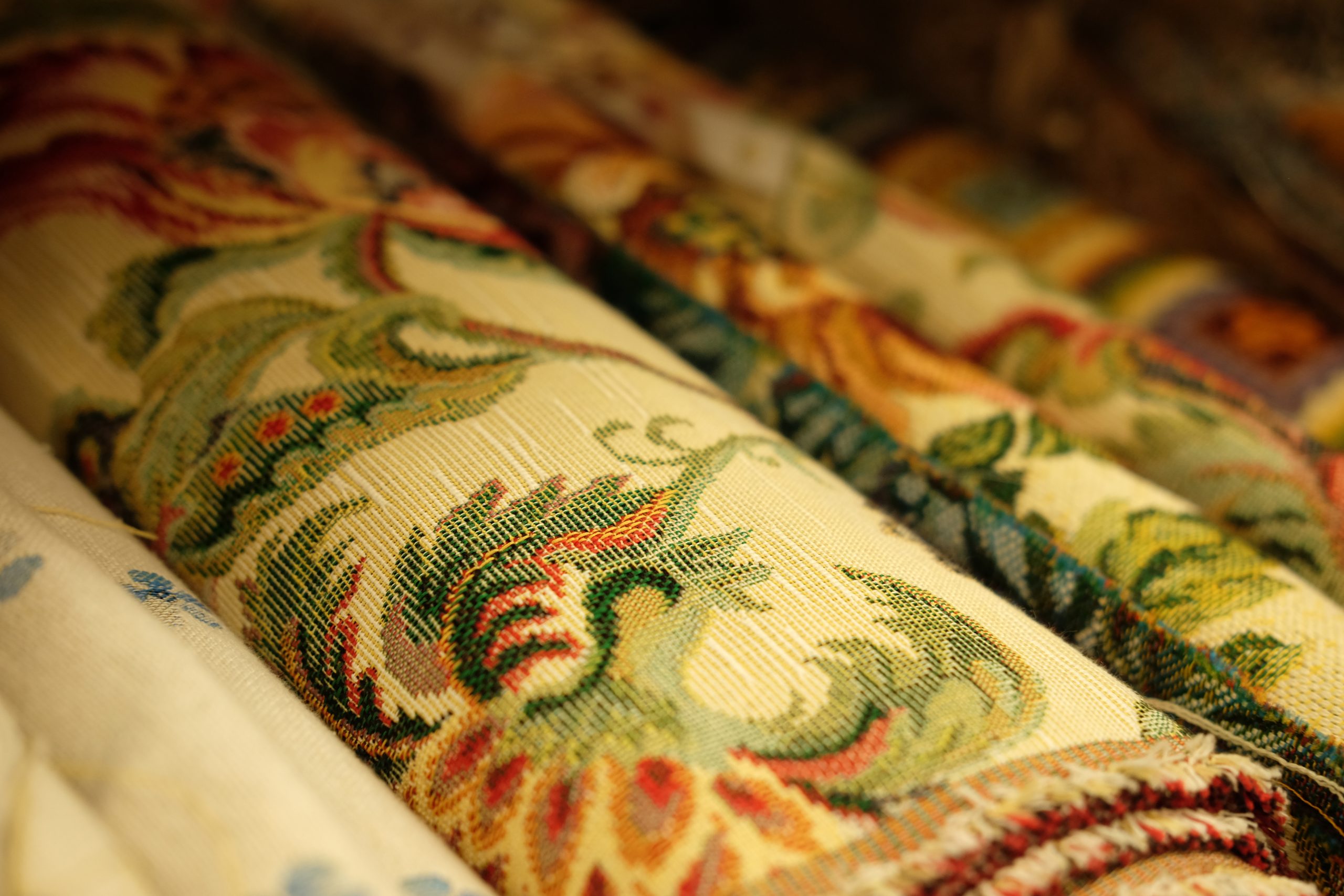 colorful fabrics in the store, close up