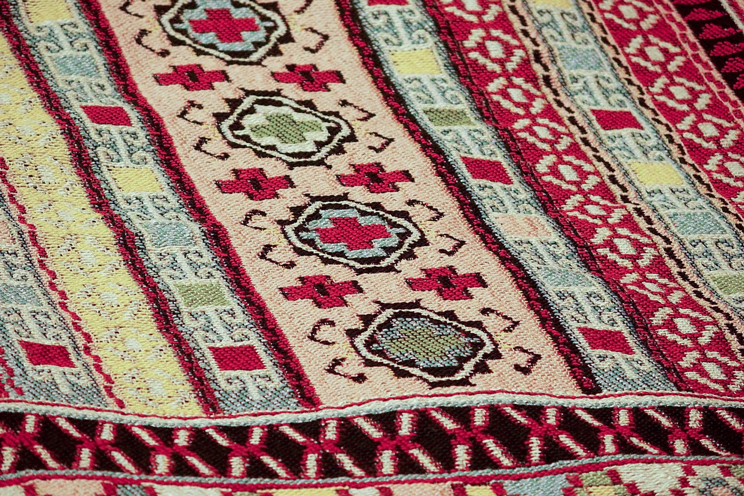 a beautiful interesting background with handmade Turkish rugs in close-up